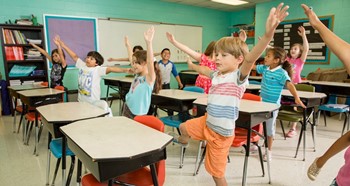 Students raising hands for GoNoodle