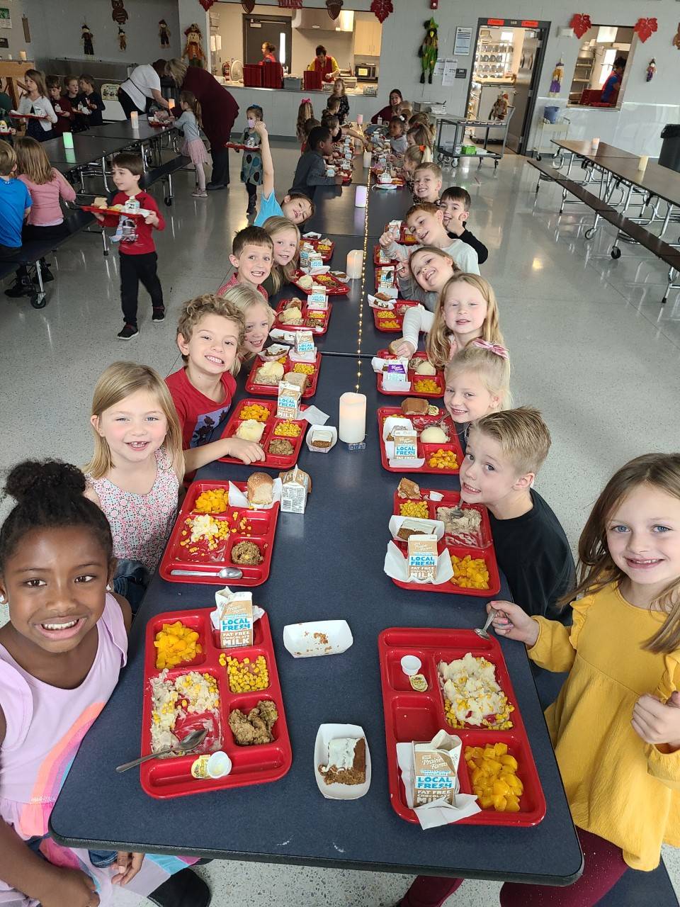1st grade class eating lunch in cafeteria