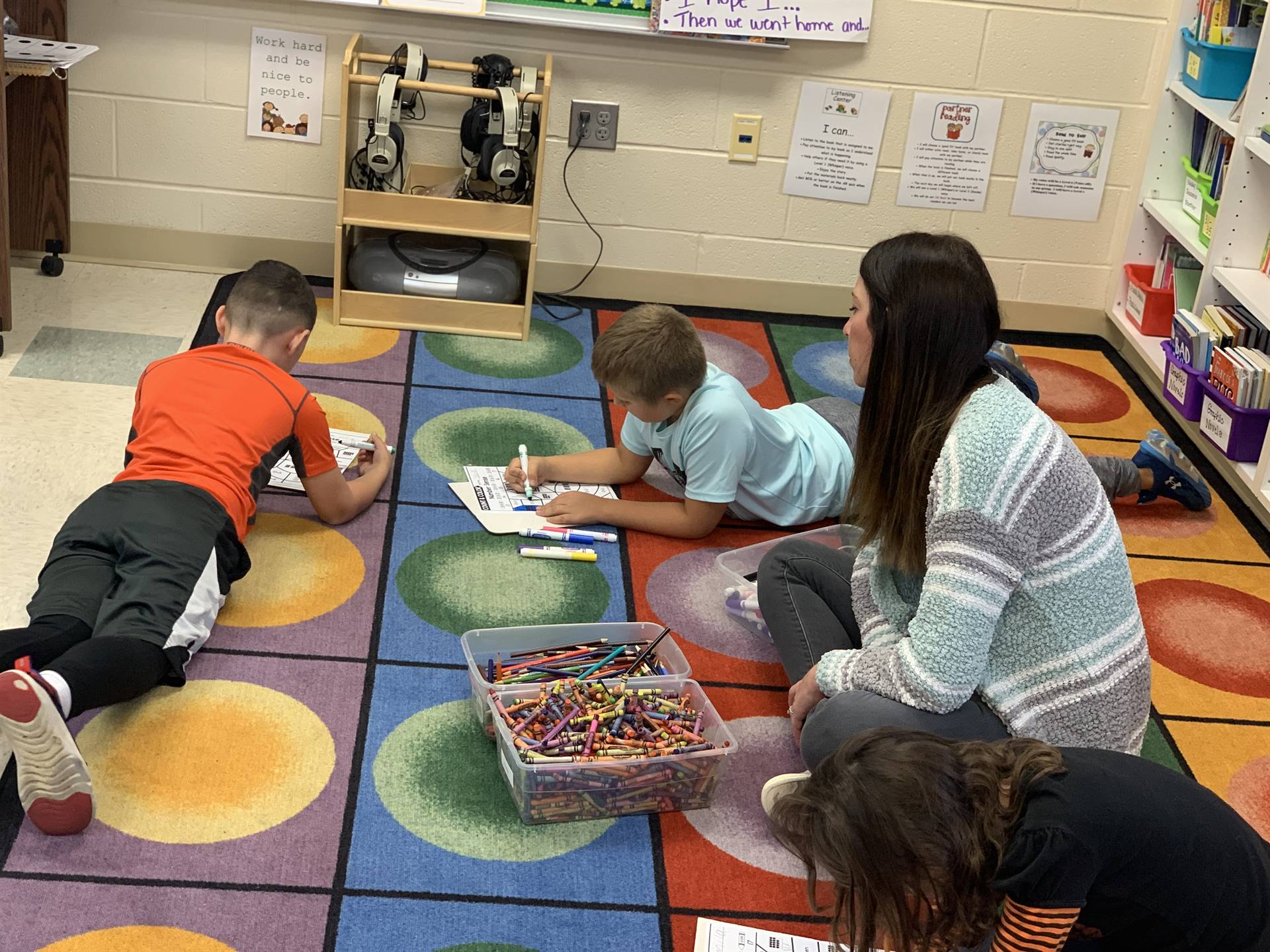 EES - Paraprofessional working with second graders