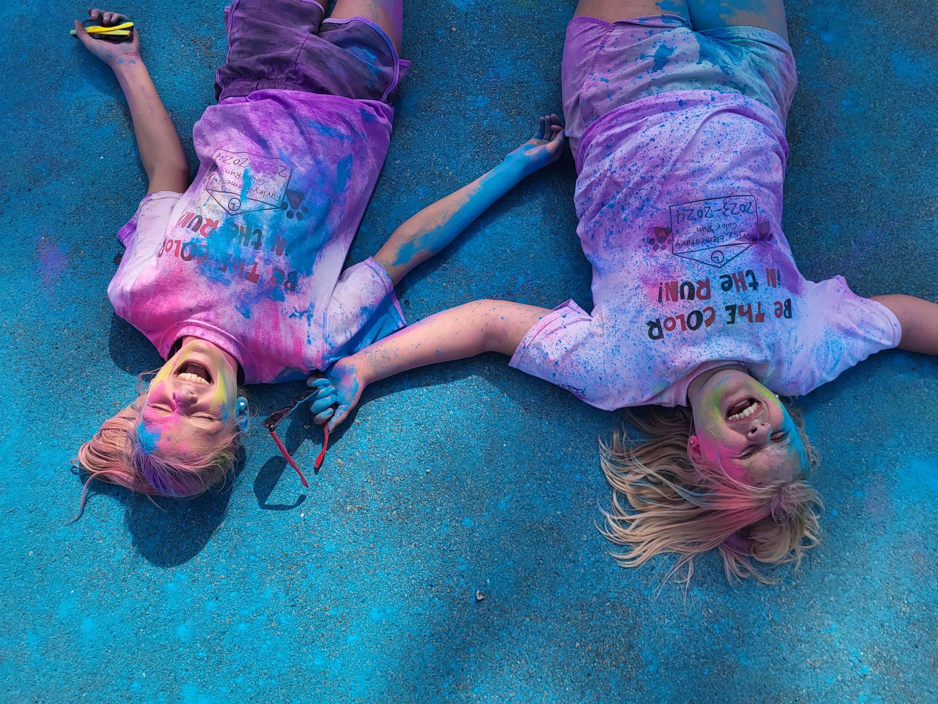 2 girls with lots of blue after color run